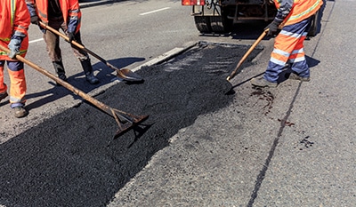 ripristino-aree-e-buche-con-asfalto